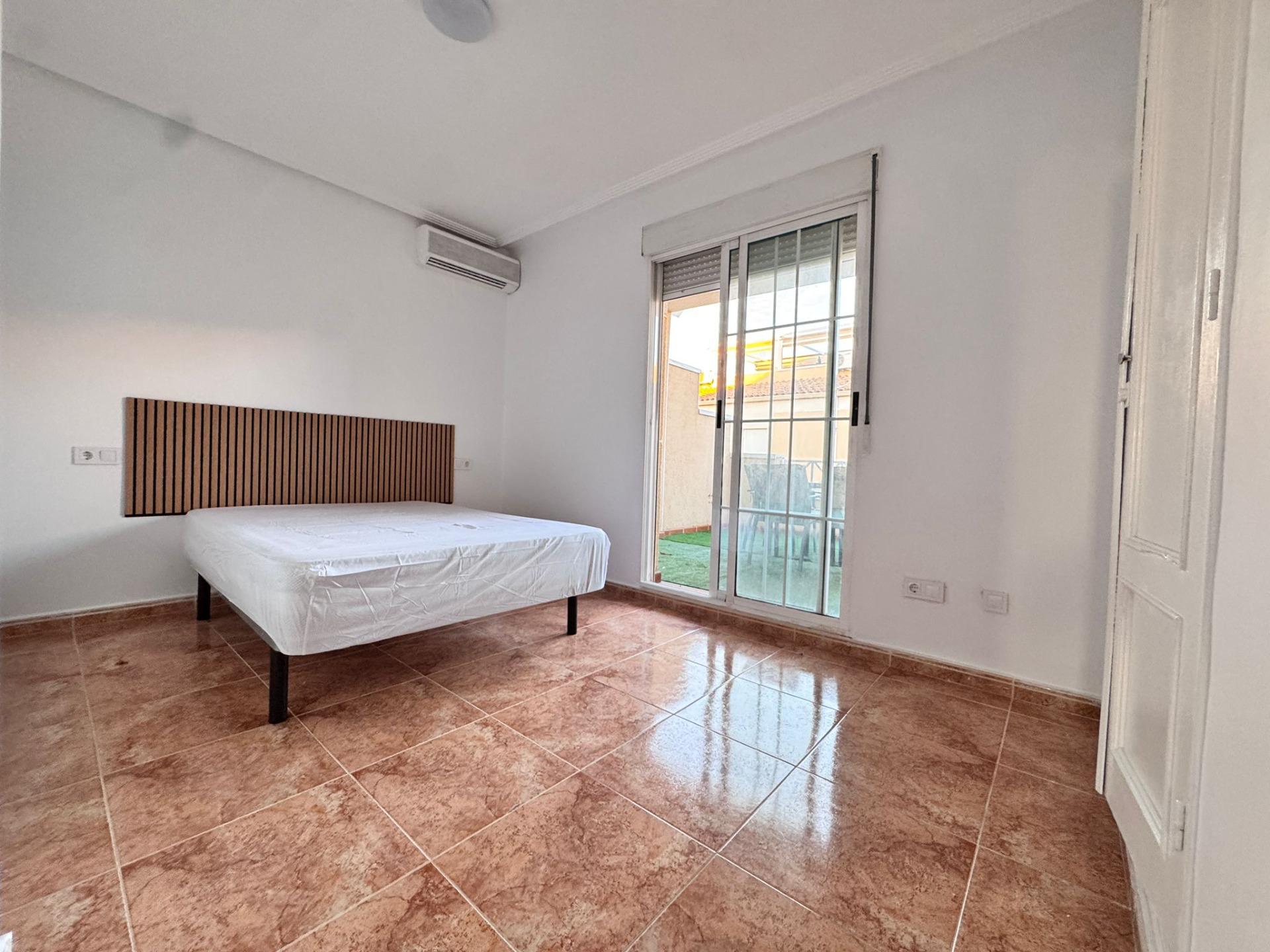 Private pool and surrounding terrace at 3-bedroom villa in Carrefour, Torrevieja