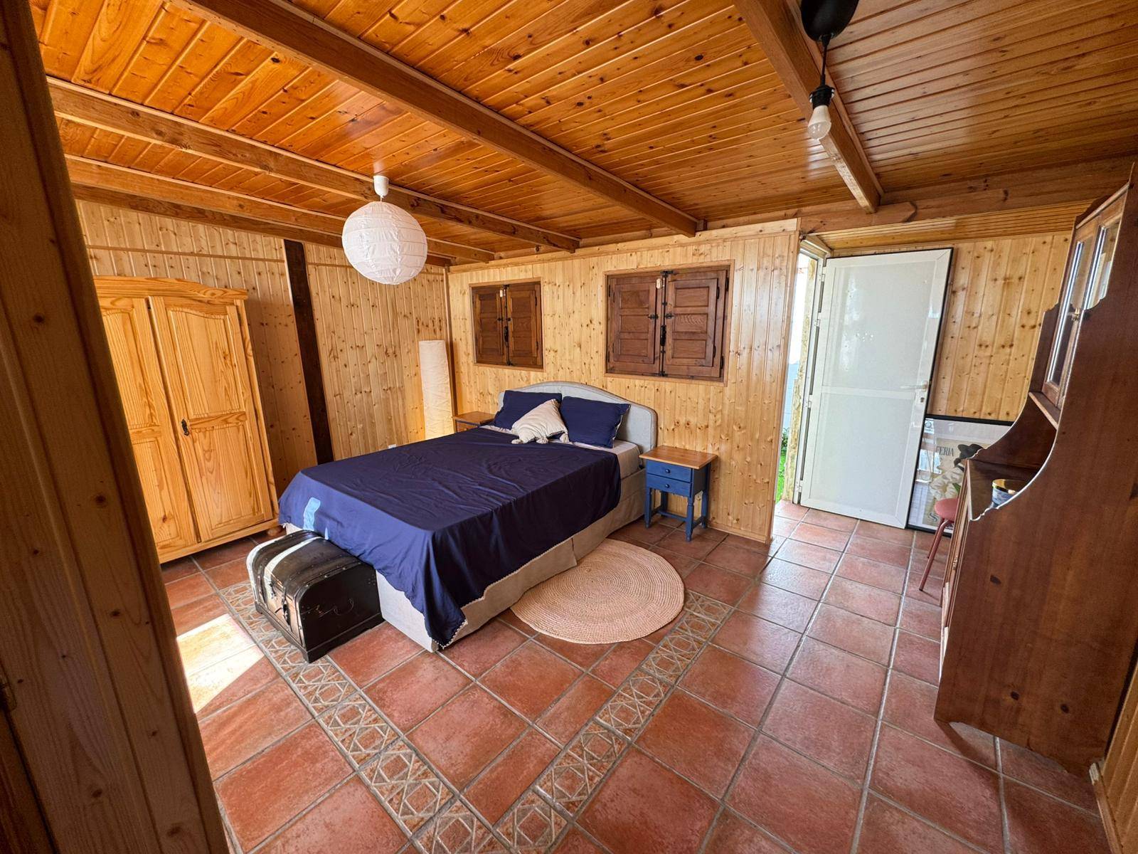 Rooftop solarium with tiled floor
