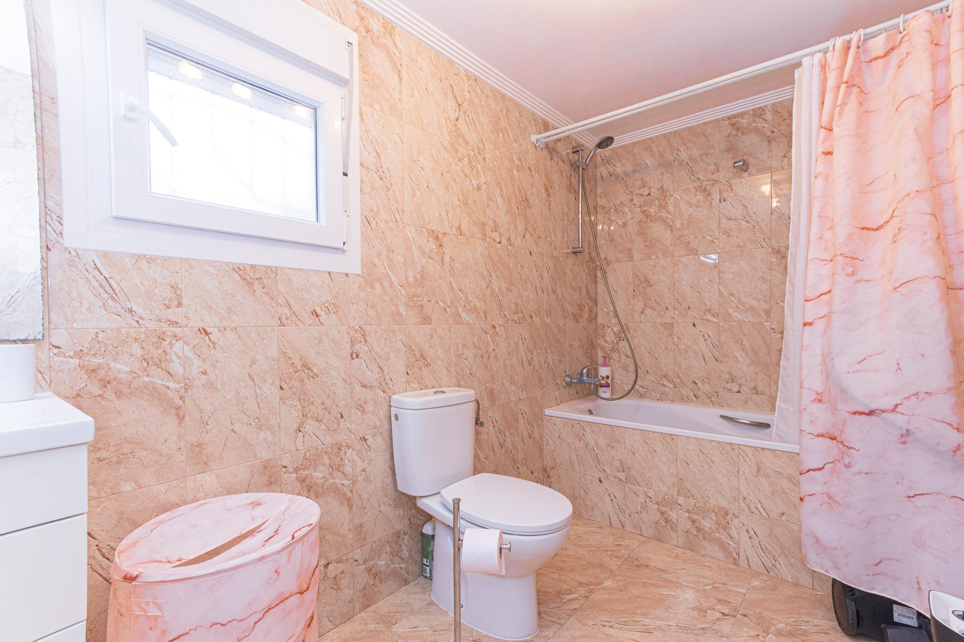 Third bathroom with basin and mirror