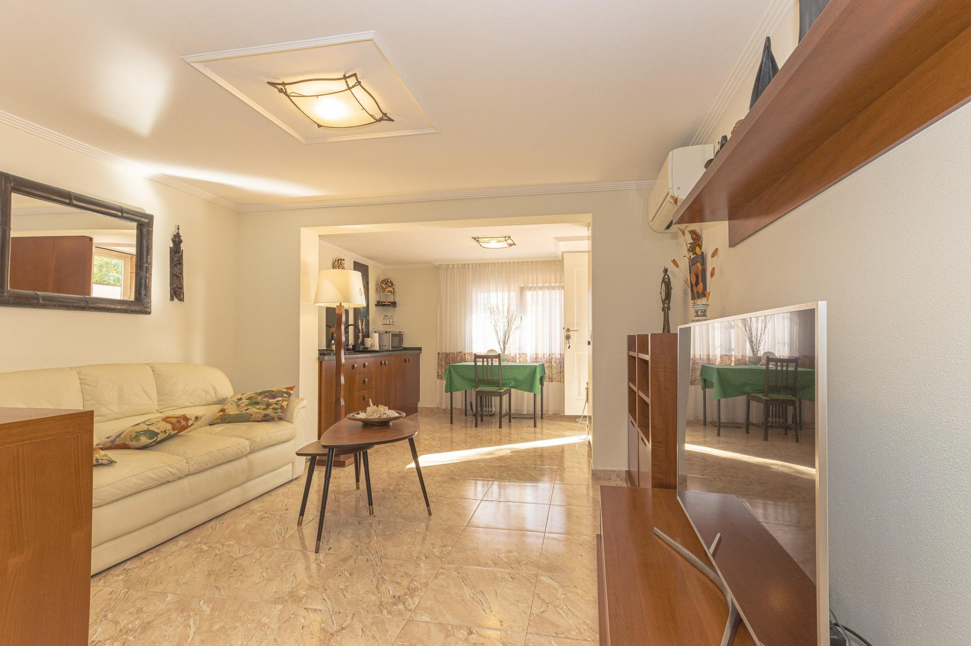 Second bedroom with built-in wardrobe and natural light