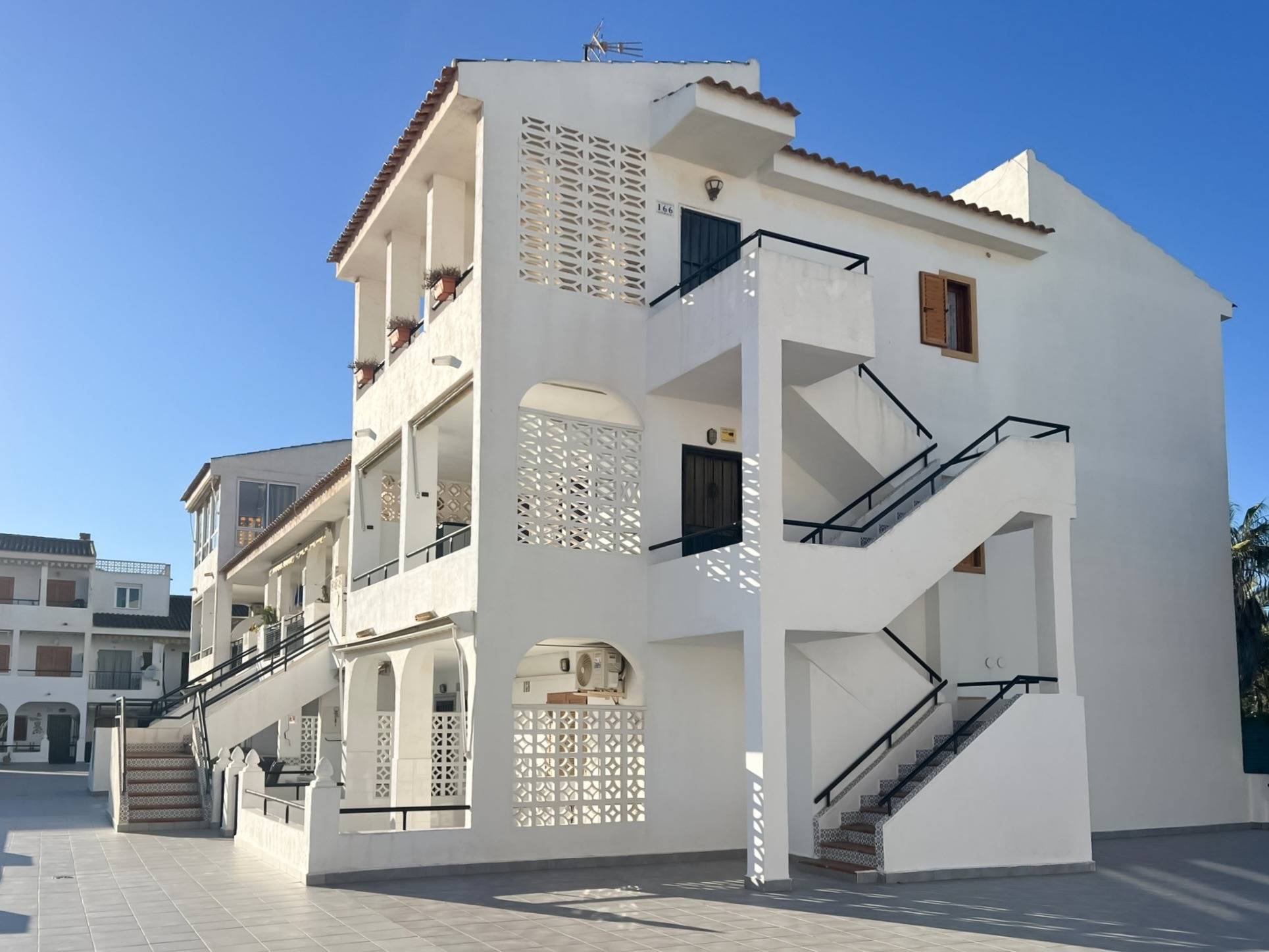 Full exterior view of the bungalow building
