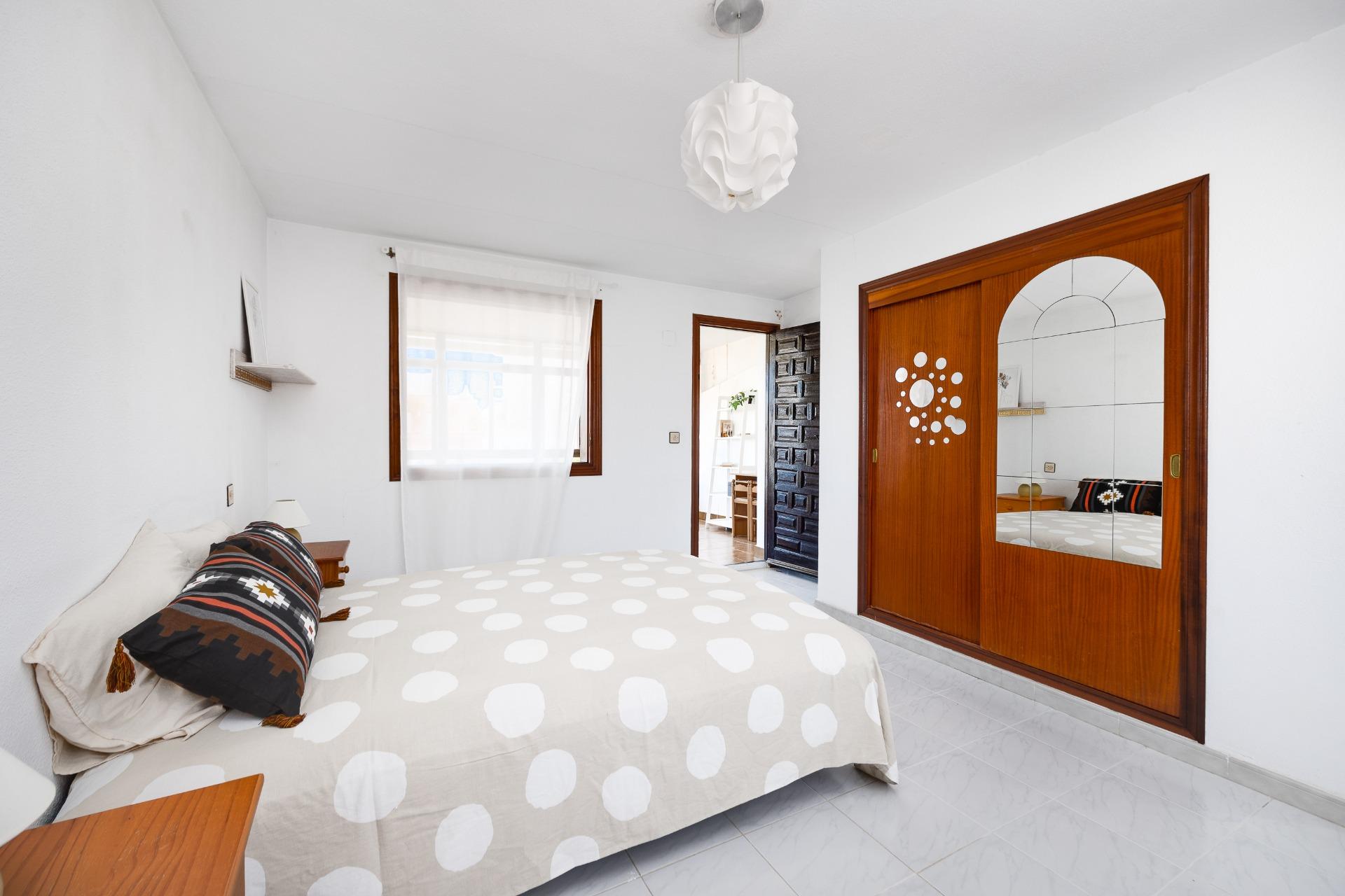 Bedroom with wall storage