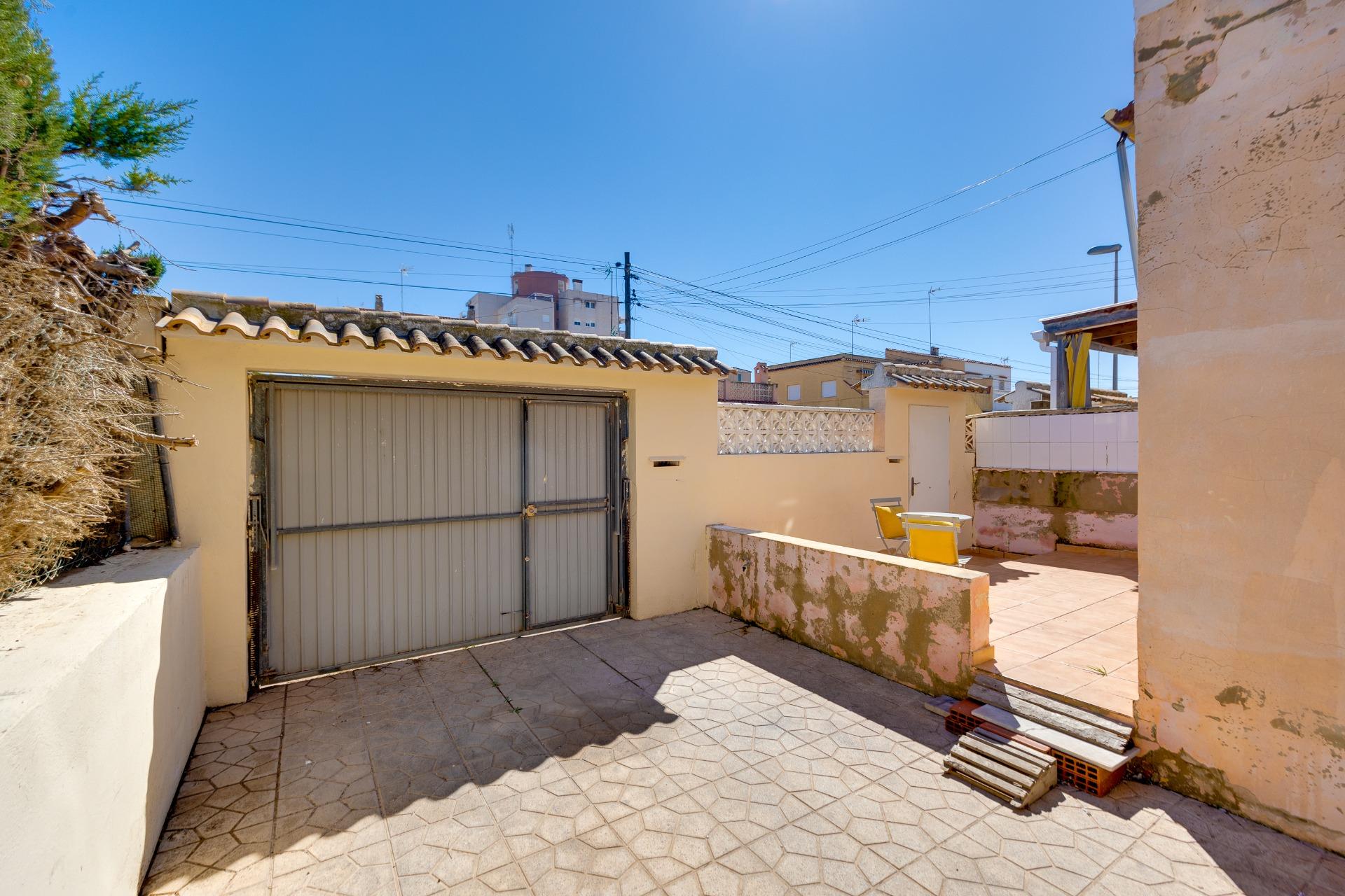 Garage and covered parking area