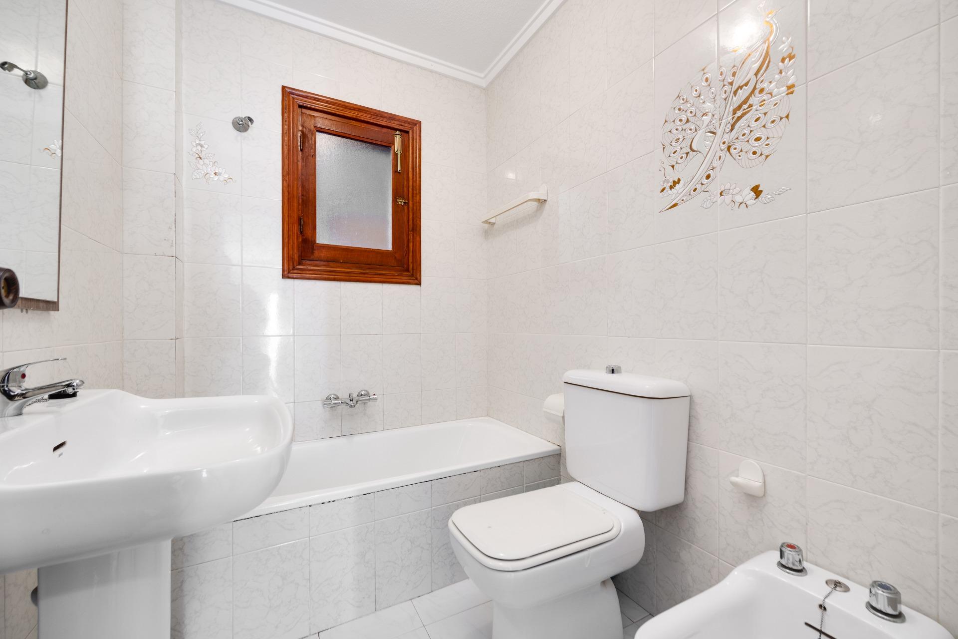 Bathroom with shower and basin