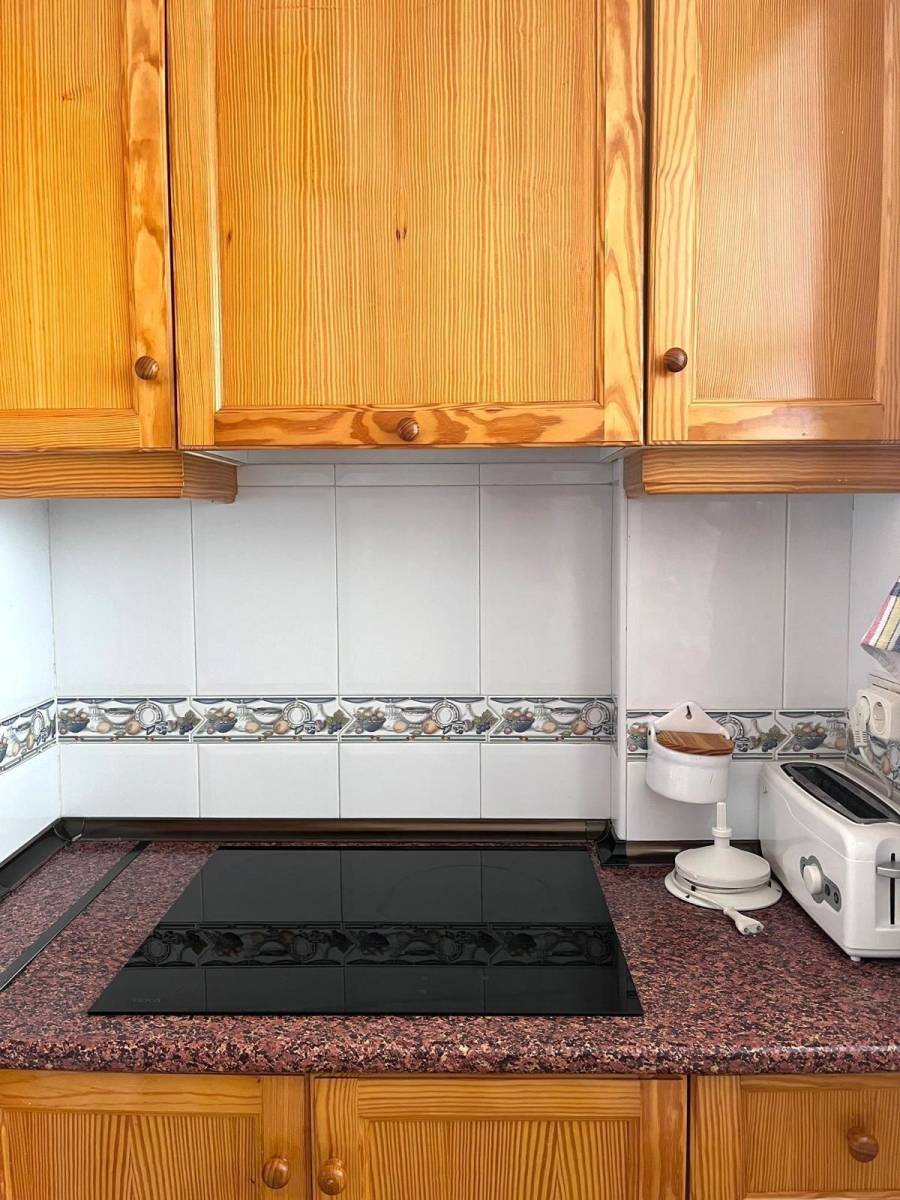 Kitchen worktop and hob detail in penthouse apartment, Acequion