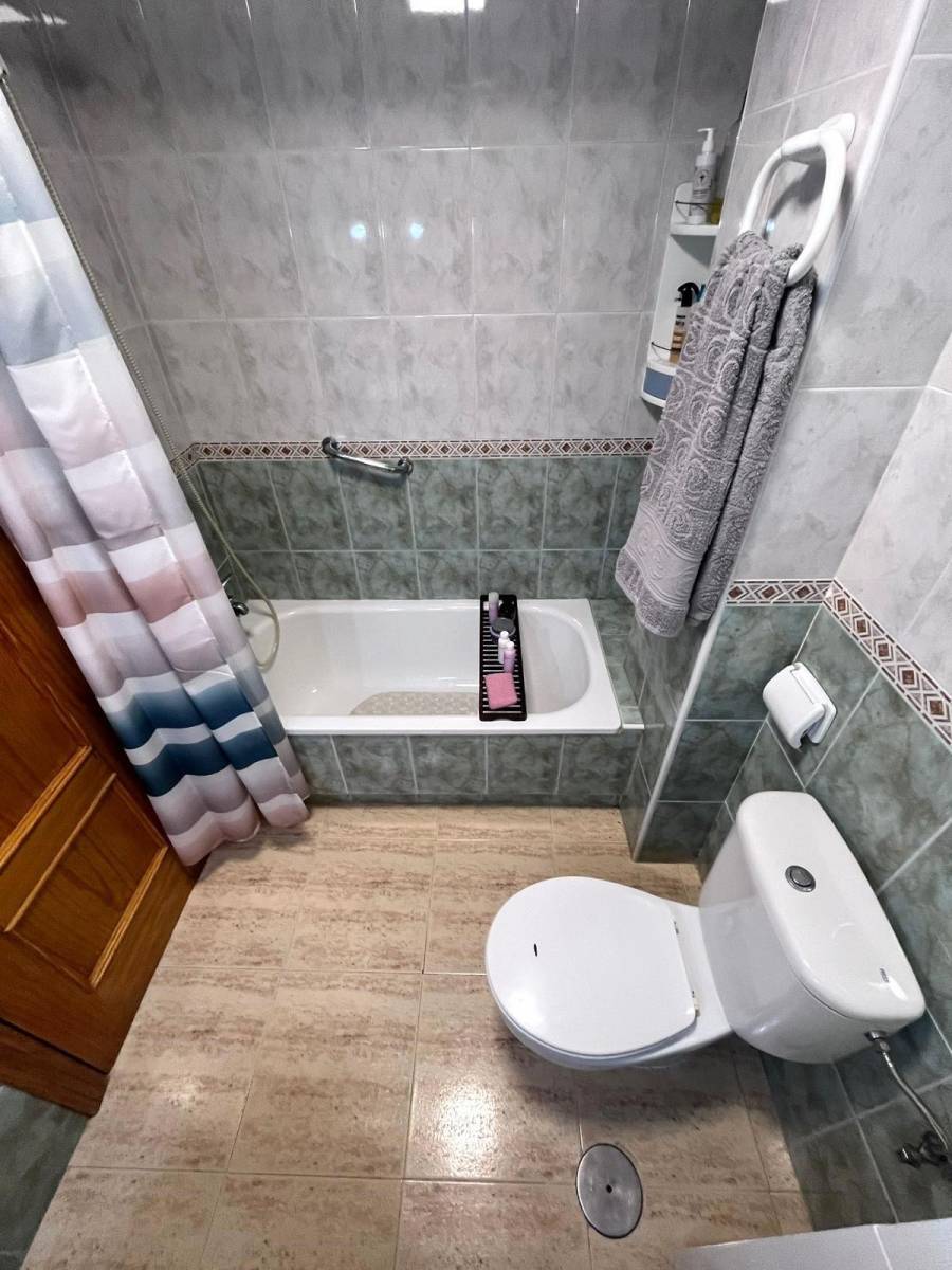 Bedroom with natural light from window in 1-bedroom penthouse, Acequion