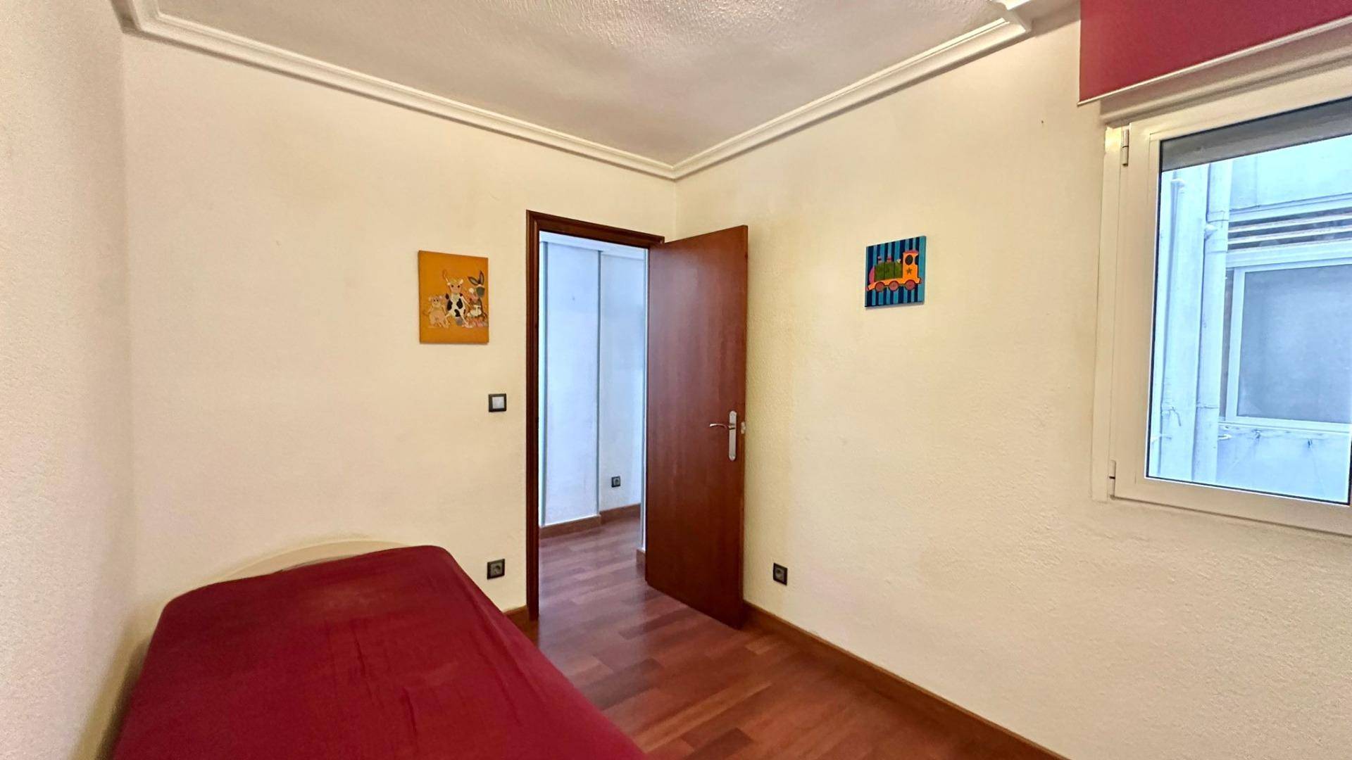 Hallway connecting the main rooms of the apartment