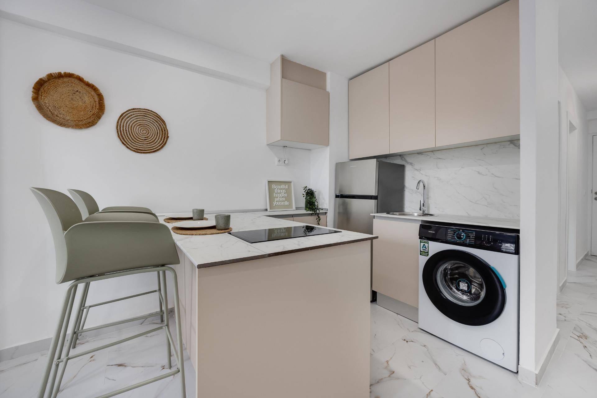 Bathroom basin and wall tiles in 1-bedroom apartment, Cabo Cervera, Torrevieja