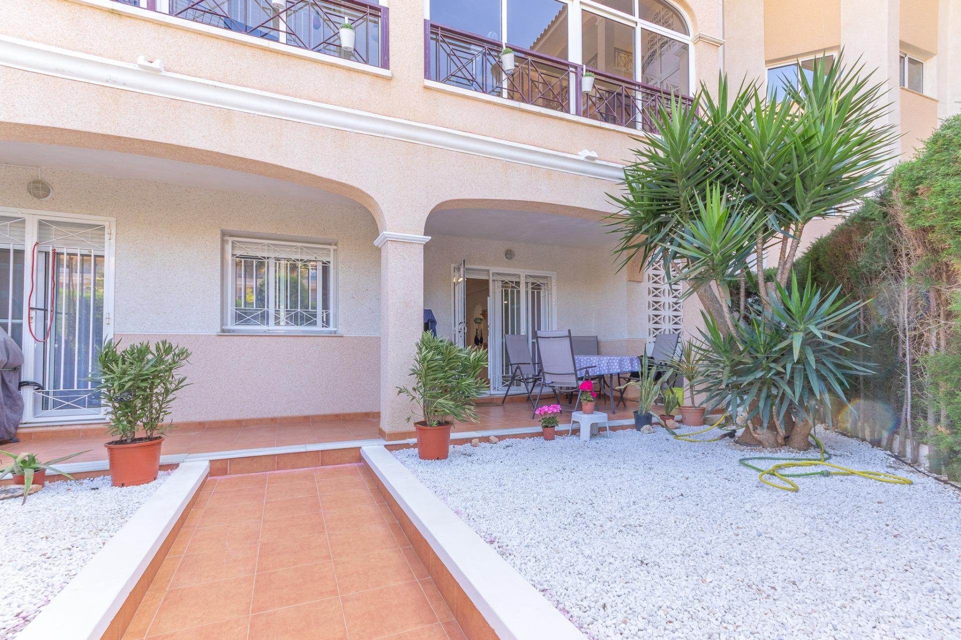 Open-plan living and dining area in ground-floor apartment, Playa Flamenca Norte
