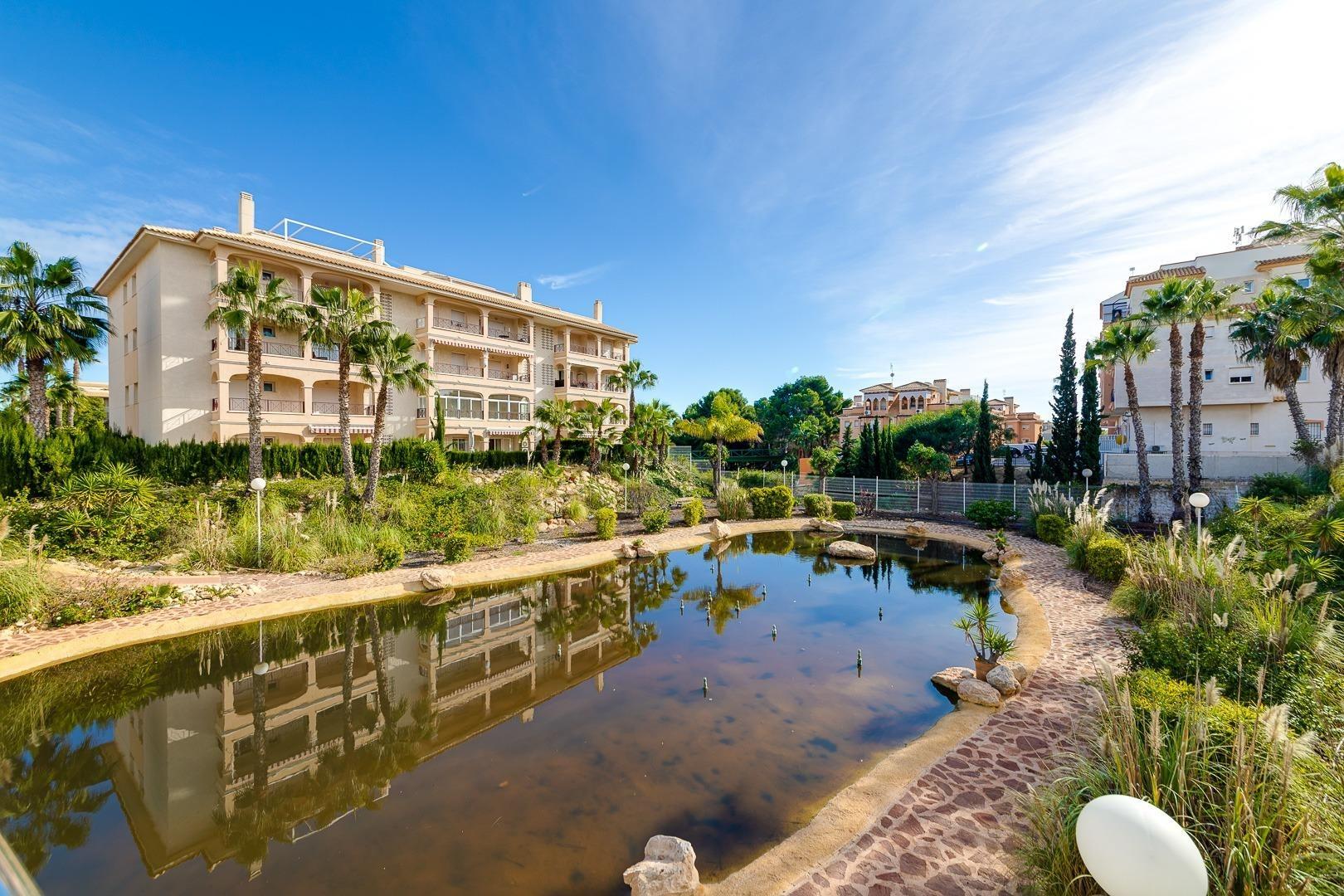 Overhead kitchen cupboards and splashback, 2-bedroom apartment, Playa Flamenca Norte