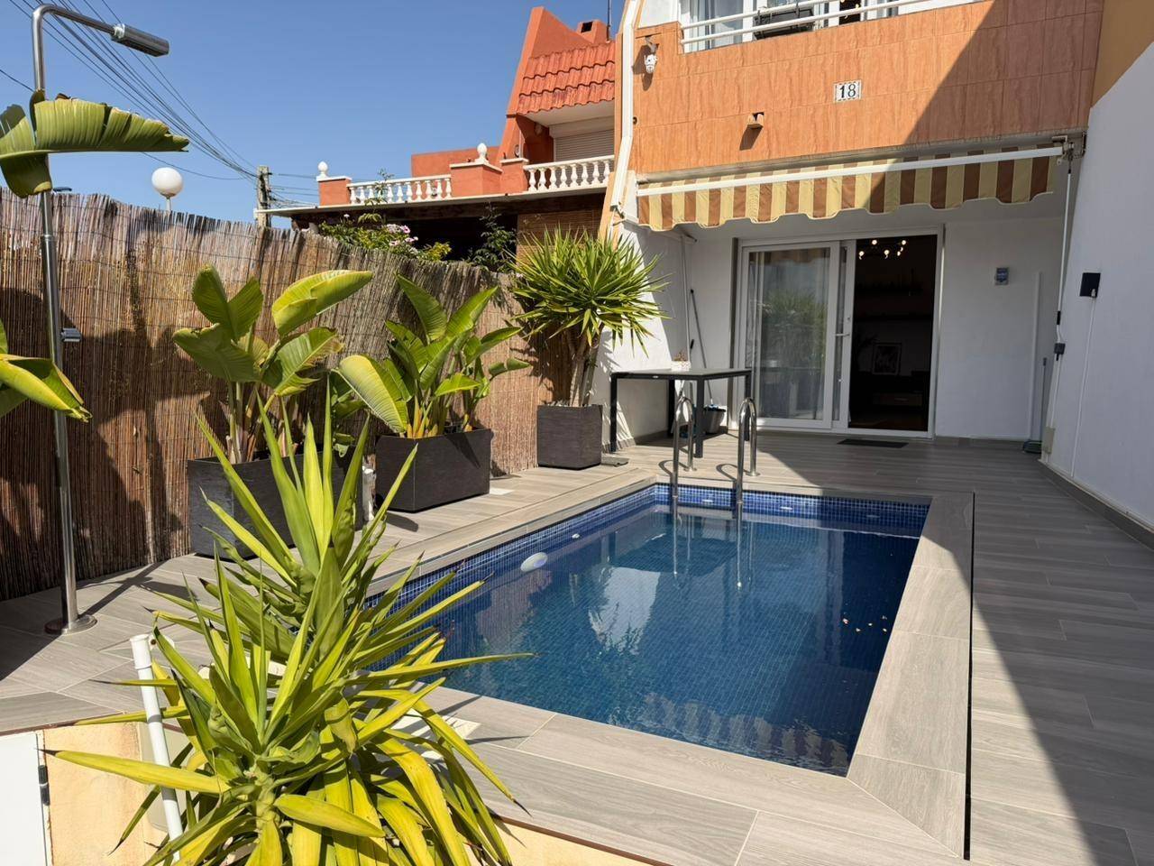 Villa for sale in Los Frutales, Torrevieja - exterior view with private pool and patio