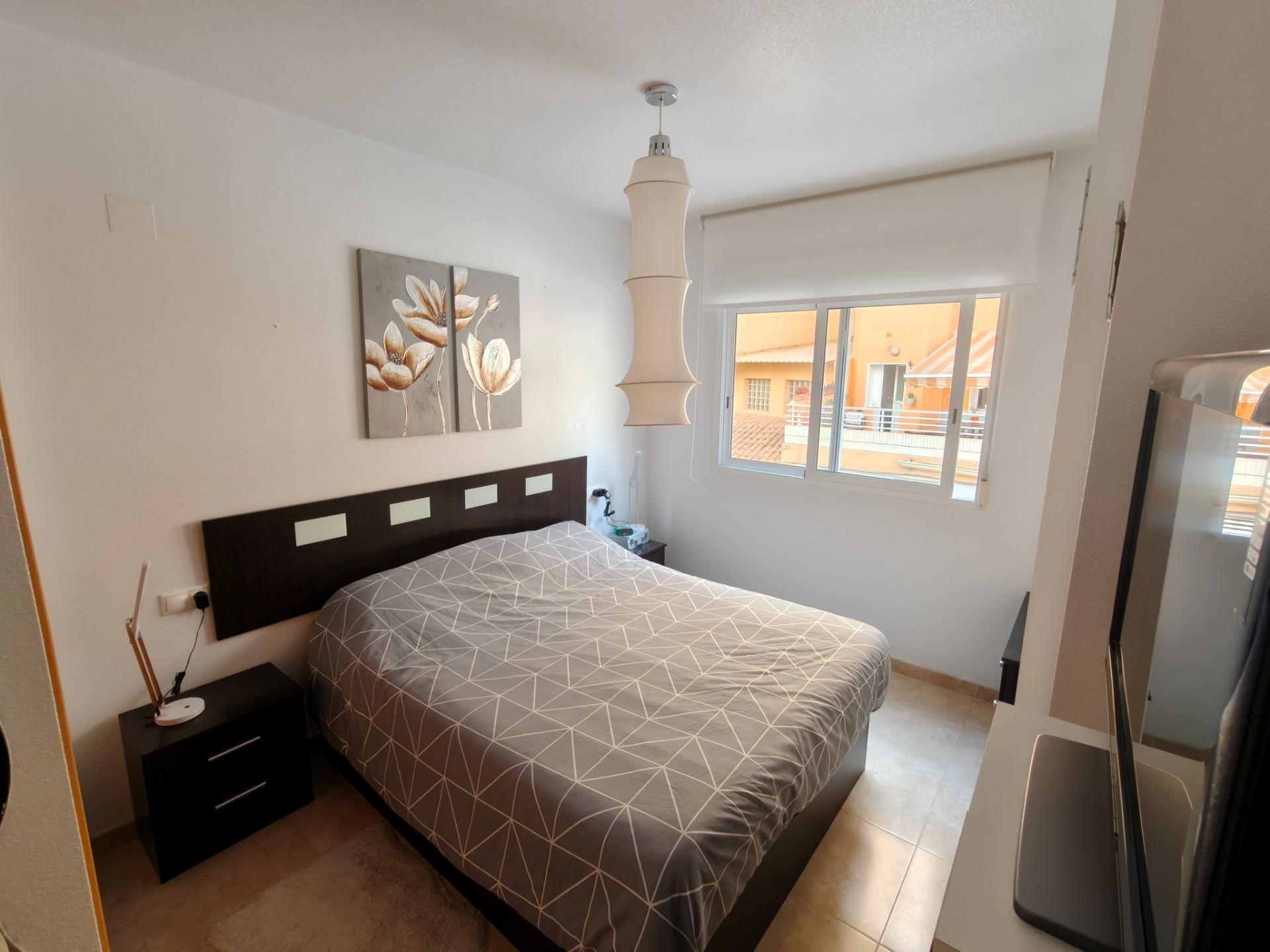 Living and dining area in 2-bedroom apartment, Playa del Cura